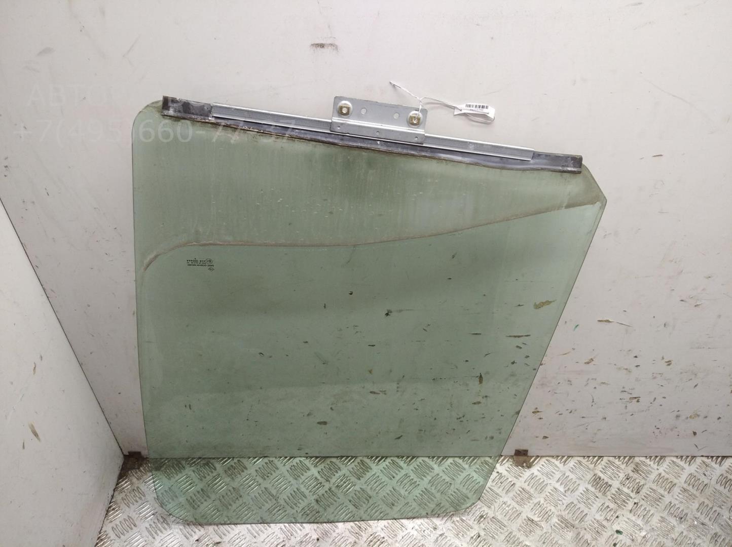 Стекло двери передней левой