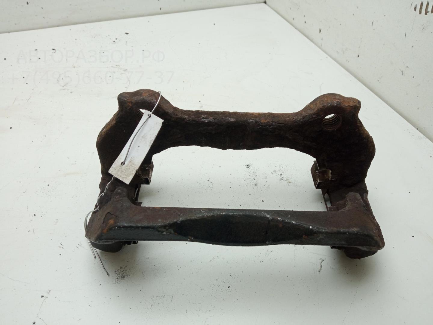Скоба суппорта переднего