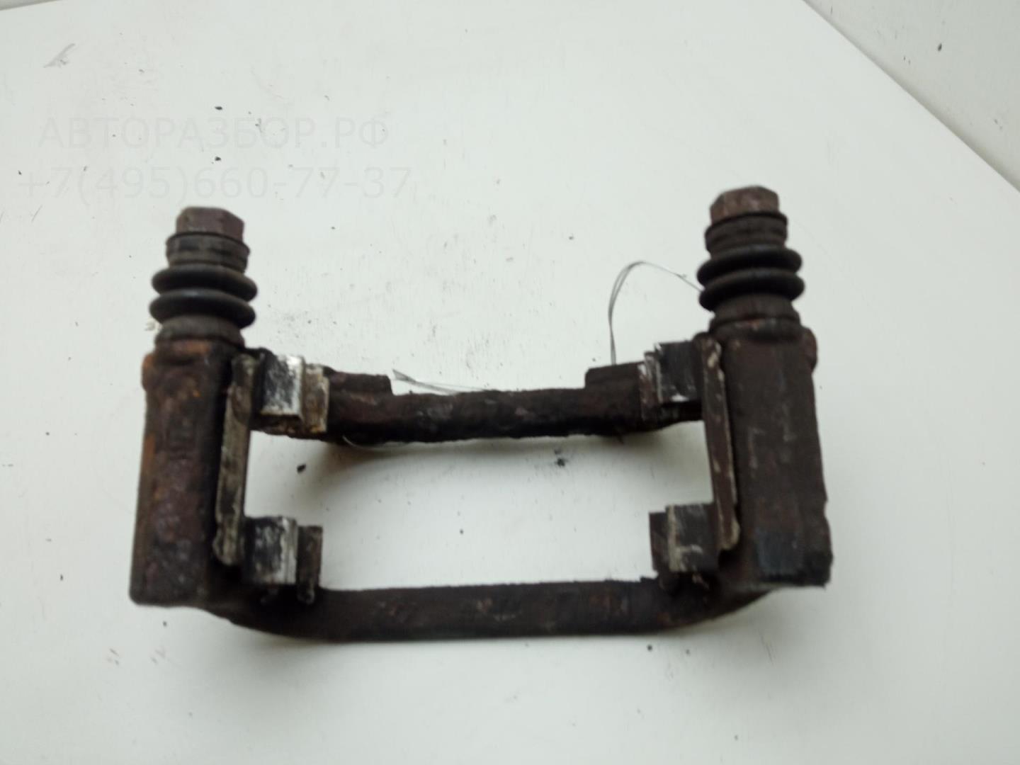 Скоба суппорта заднего