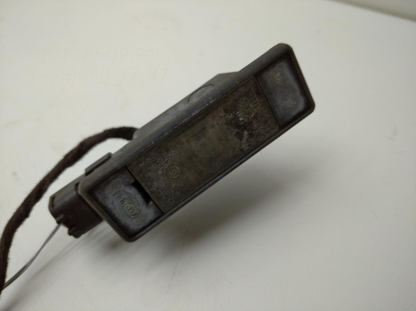 Фонарь подсветки номера