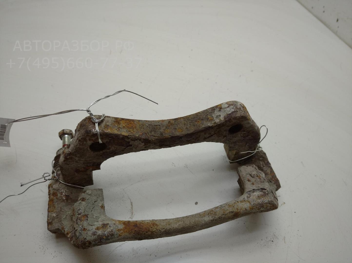 Скоба суппорта переднего