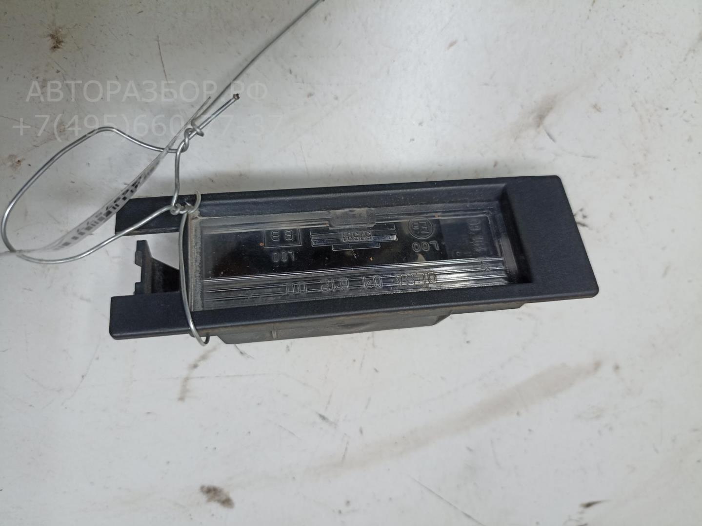 Фонарь подсветки номера