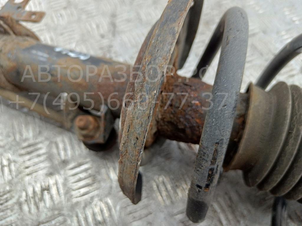 Амортизатор передний левый