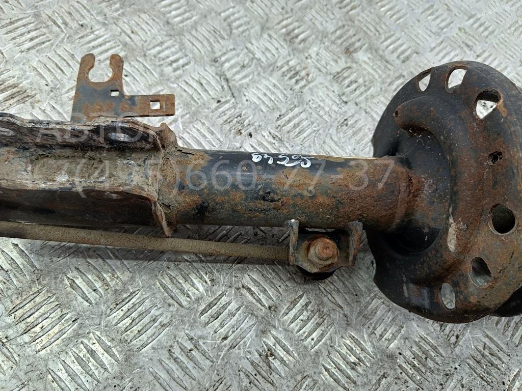 Амортизатор передний левый