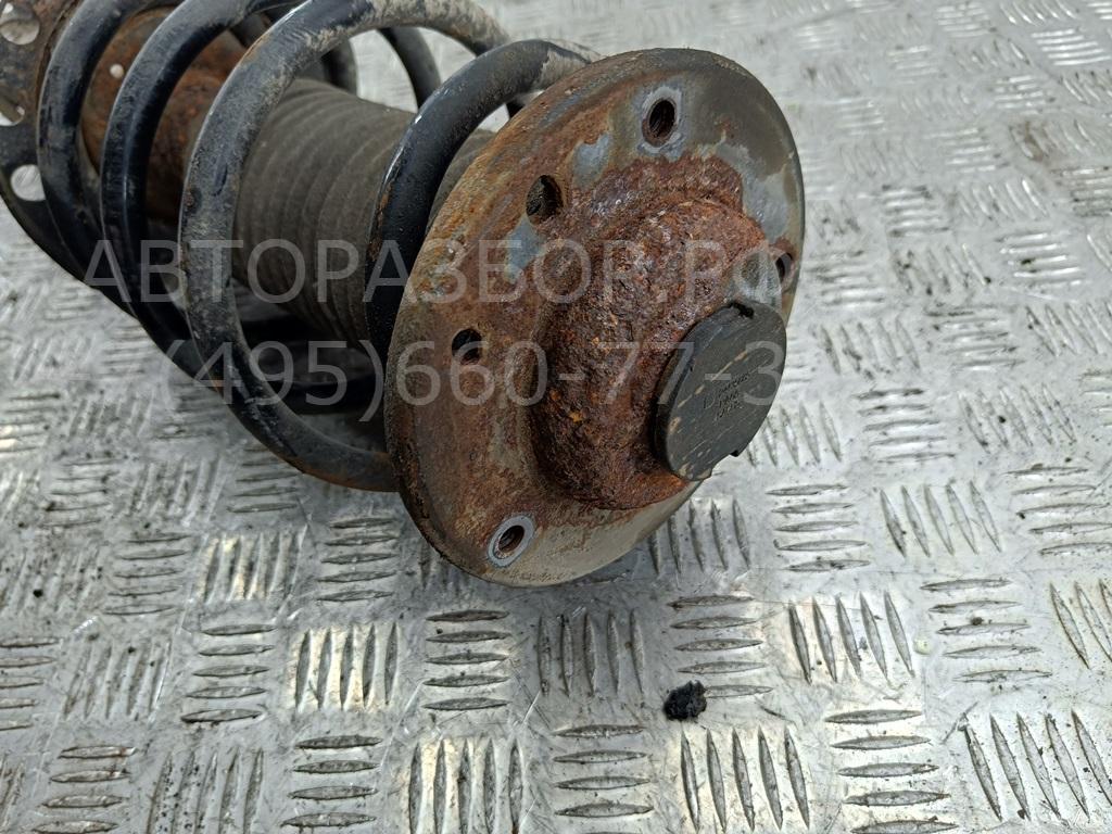 Амортизатор передний левый