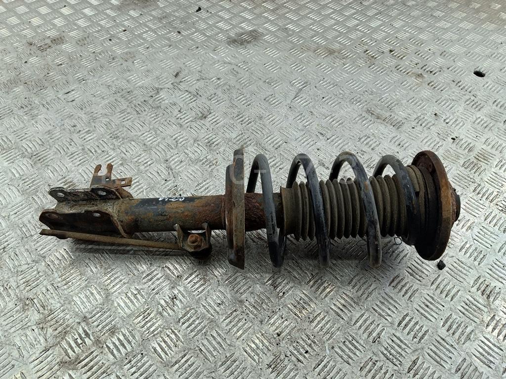 Амортизатор передний левый