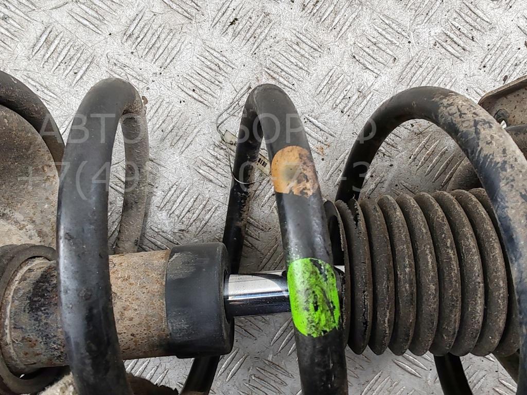 Амортизатор передний левый