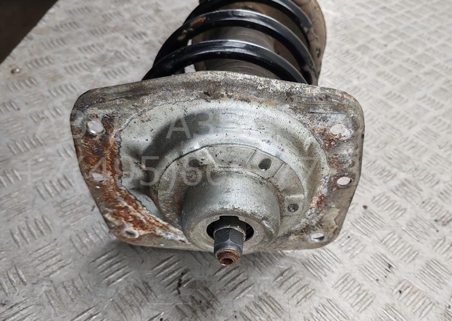 Амортизатор передний левый