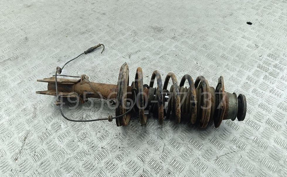 Амортизатор передний левый