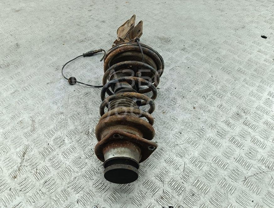 Амортизатор передний левый