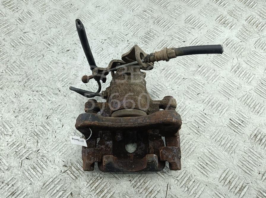 Суппорт задний левый