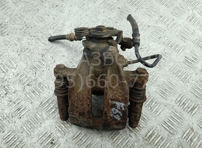 Суппорт задний левый