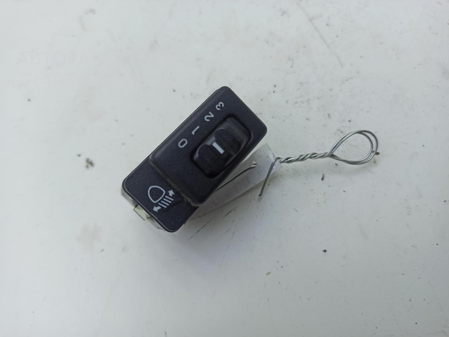 Кнопка корректора фар