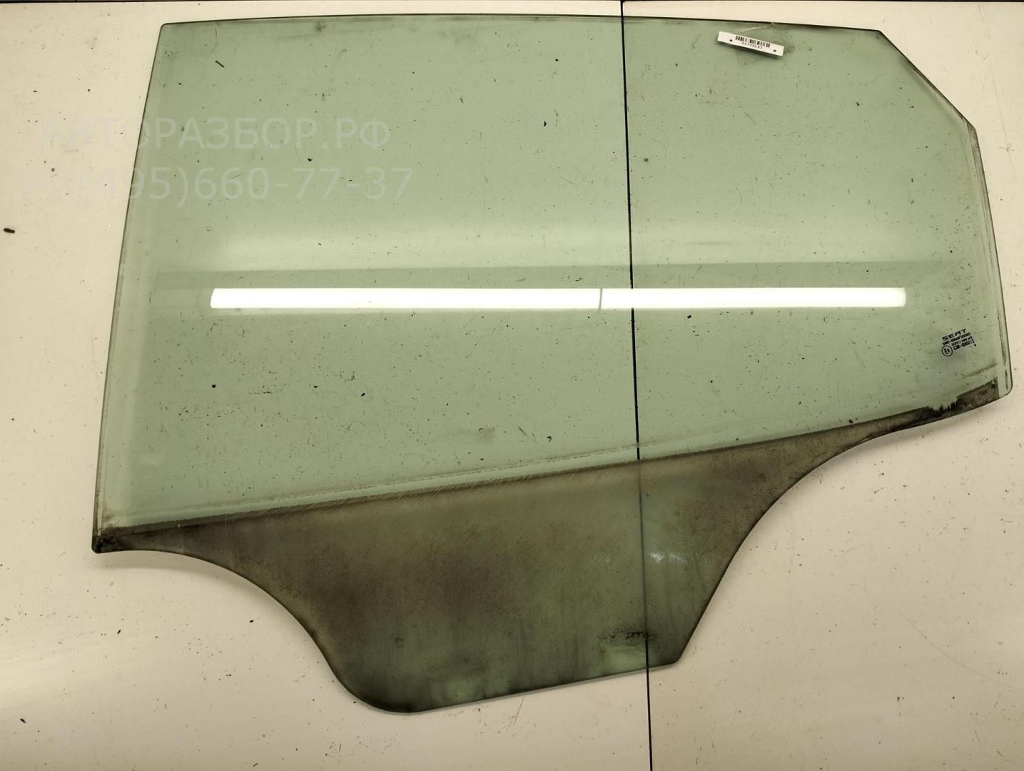 Стекло двери задней левой