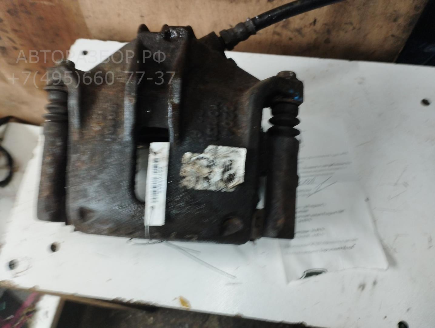 Суппорт передний левый