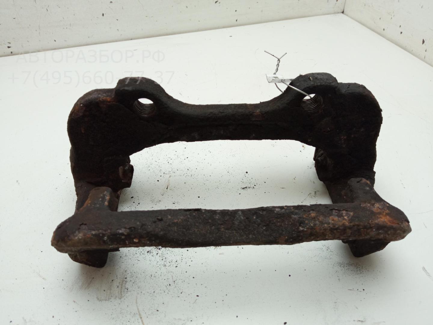 Скоба суппорта переднего
