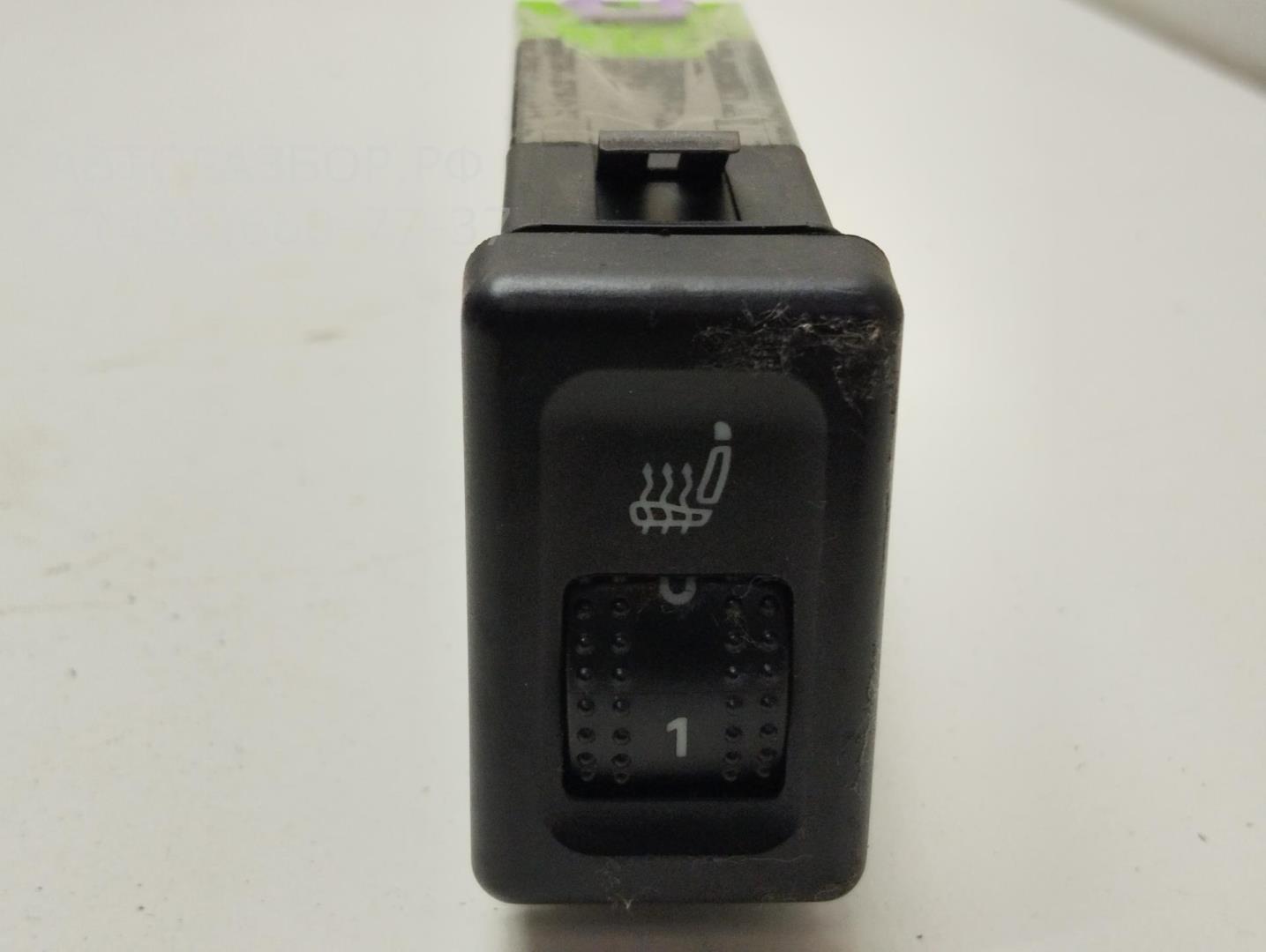 Кнопка обогрева сидений