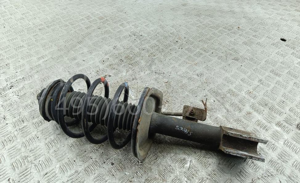 Амортизатор передний левый