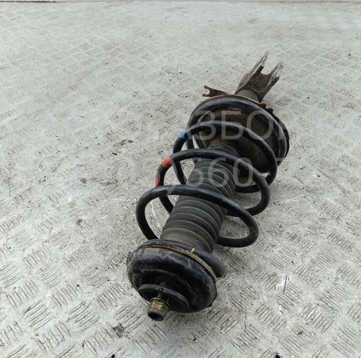 Амортизатор передний левый