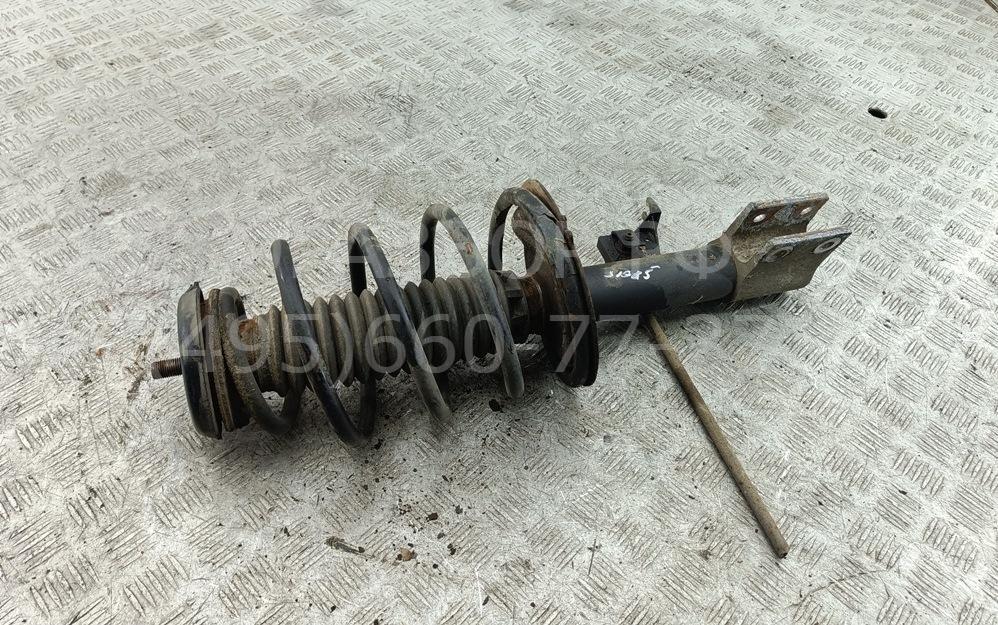 Амортизатор передний левый