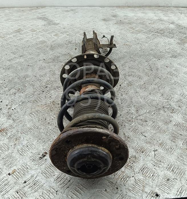 Амортизатор передний левый