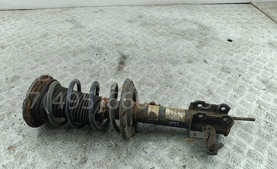 Амортизатор передний левый