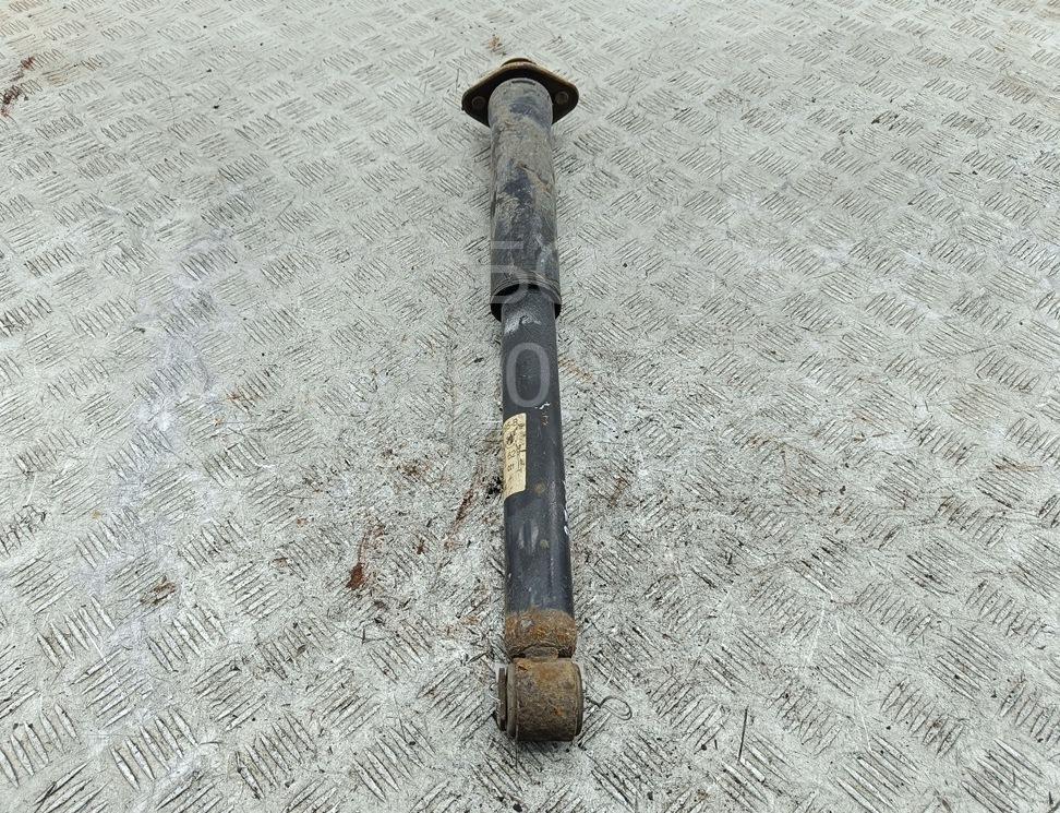 Амортизатор задний левый