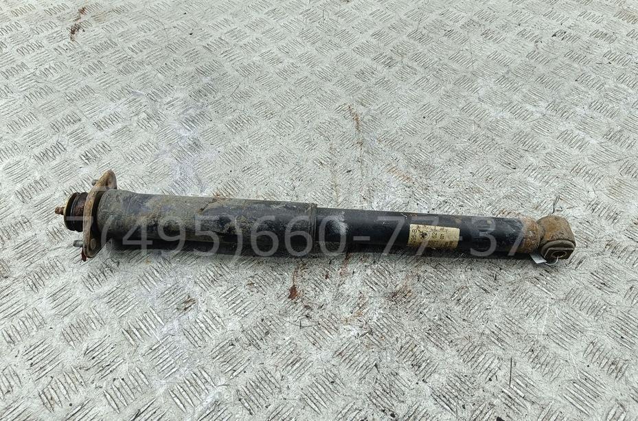 Амортизатор задний левый