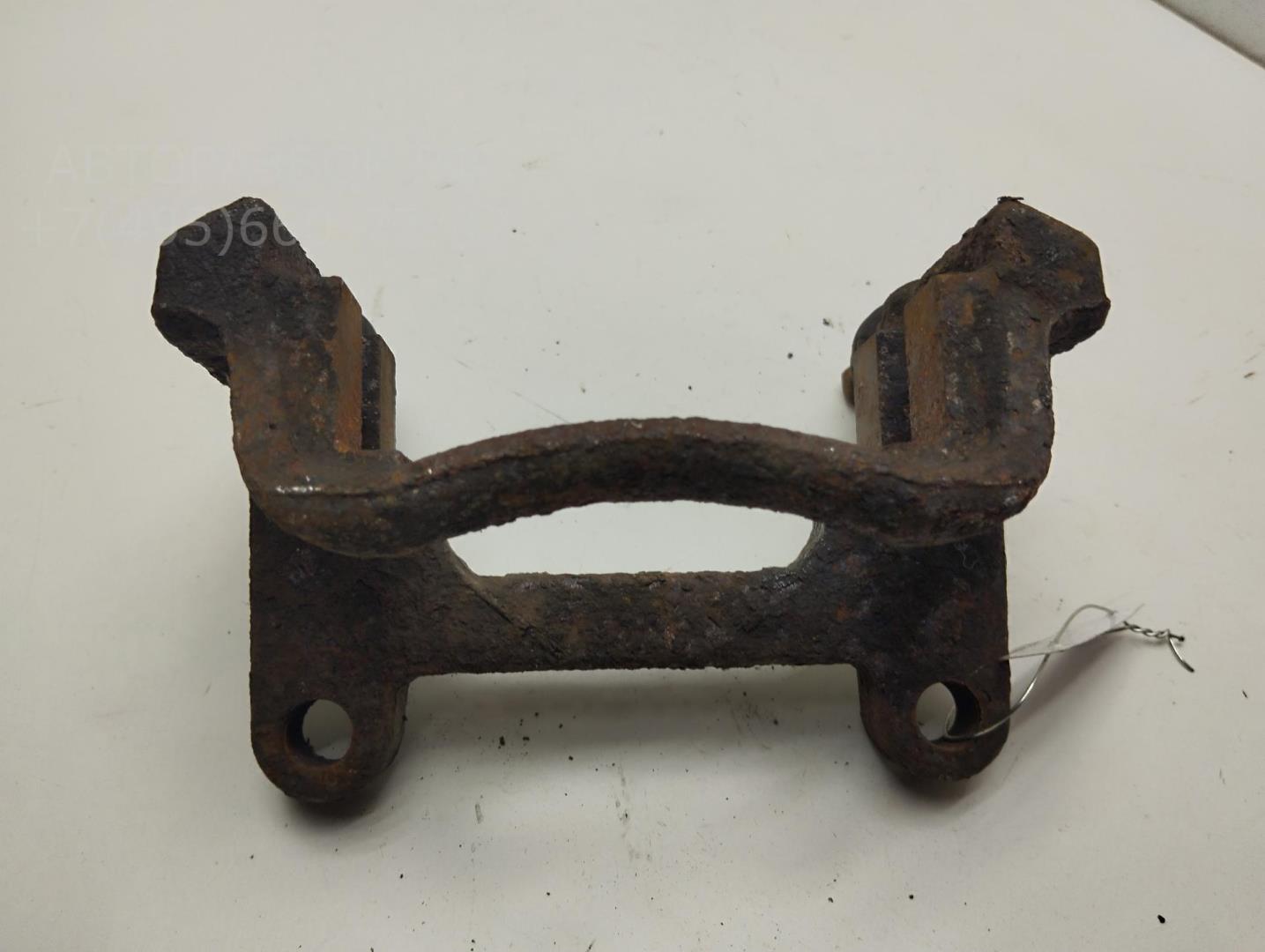 Скоба суппорта заднего