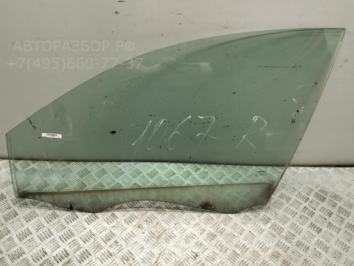 Стекло двери передней левой