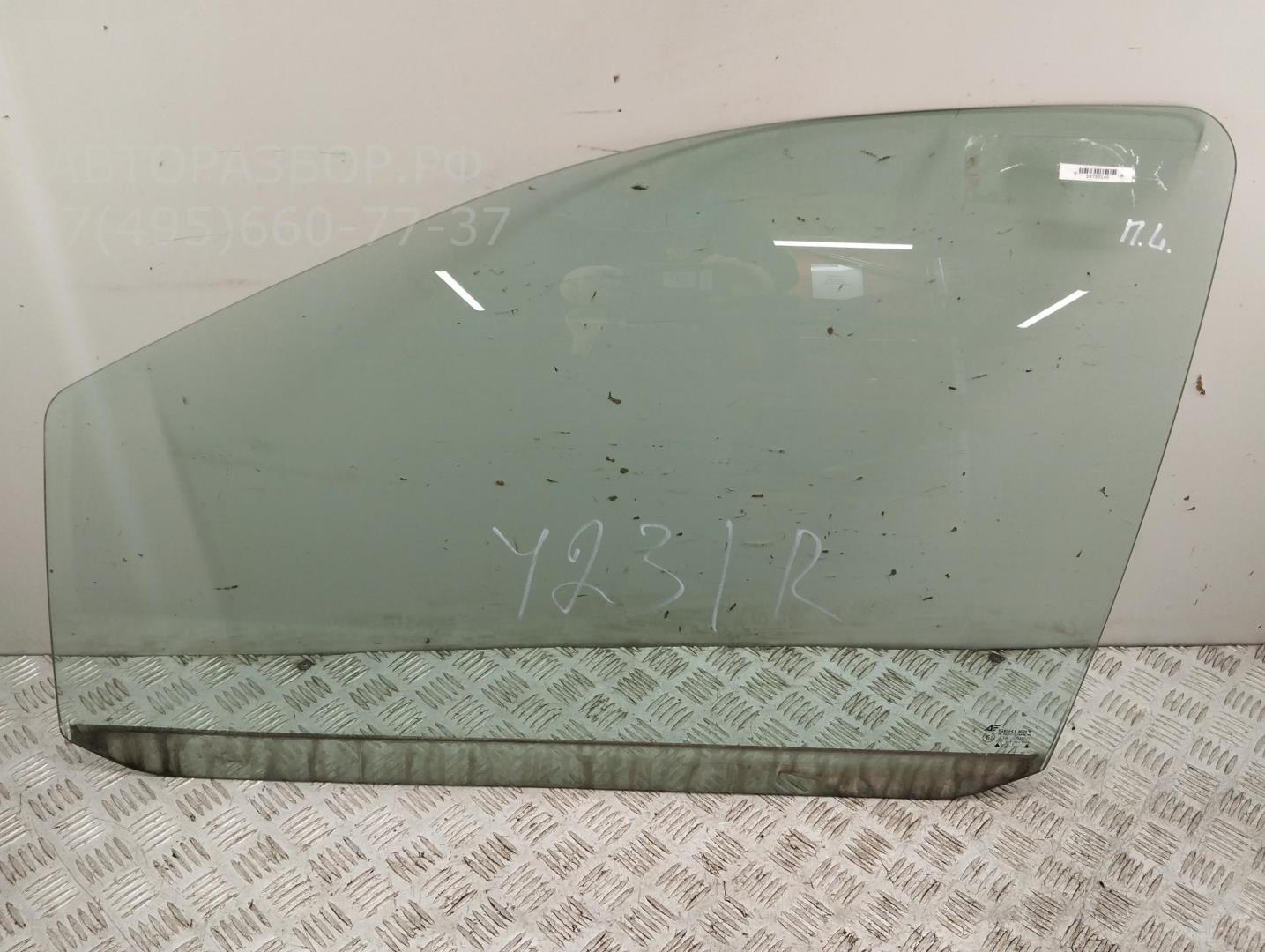 Стекло двери передней левой