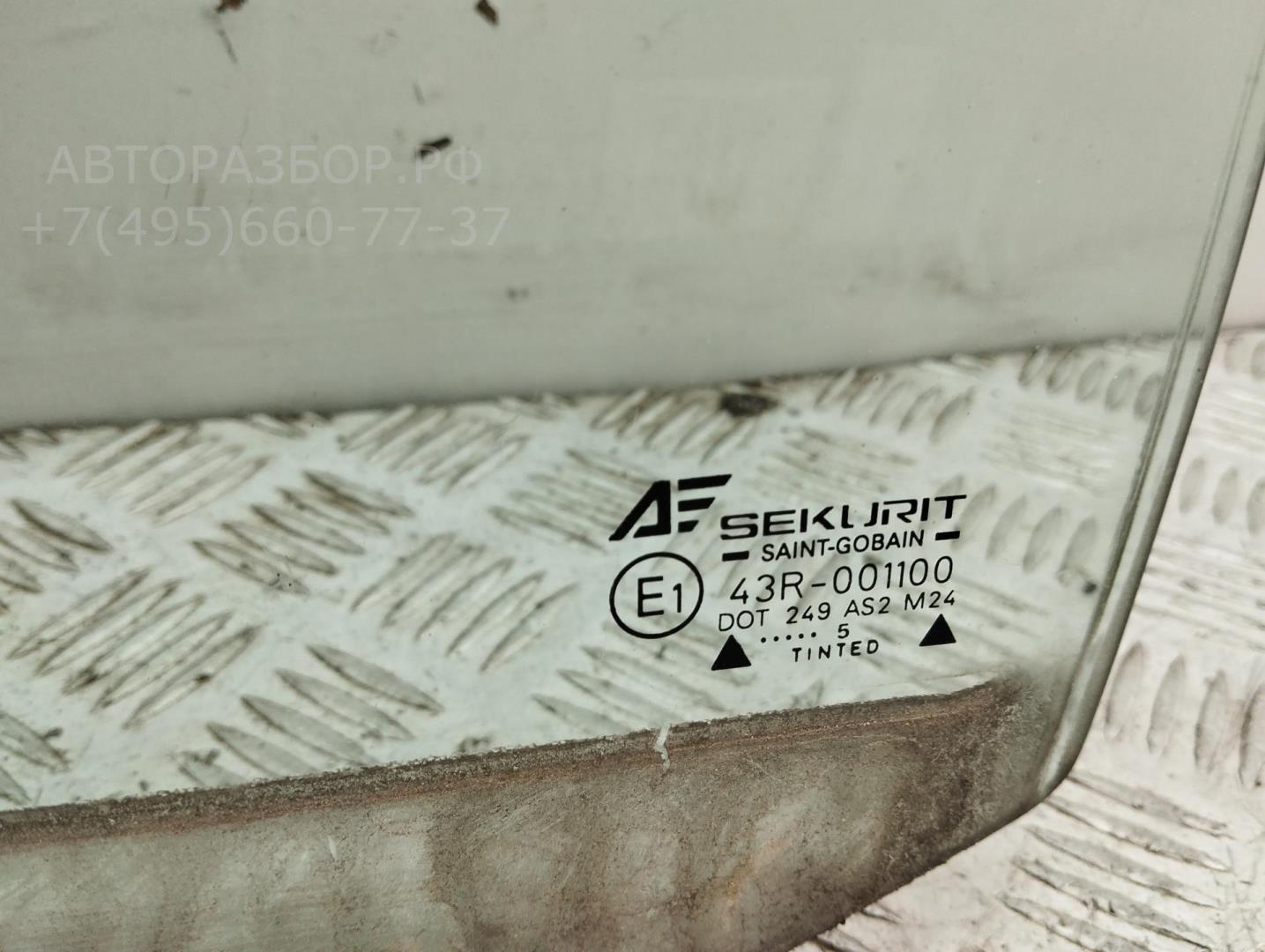 Стекло двери передней левой