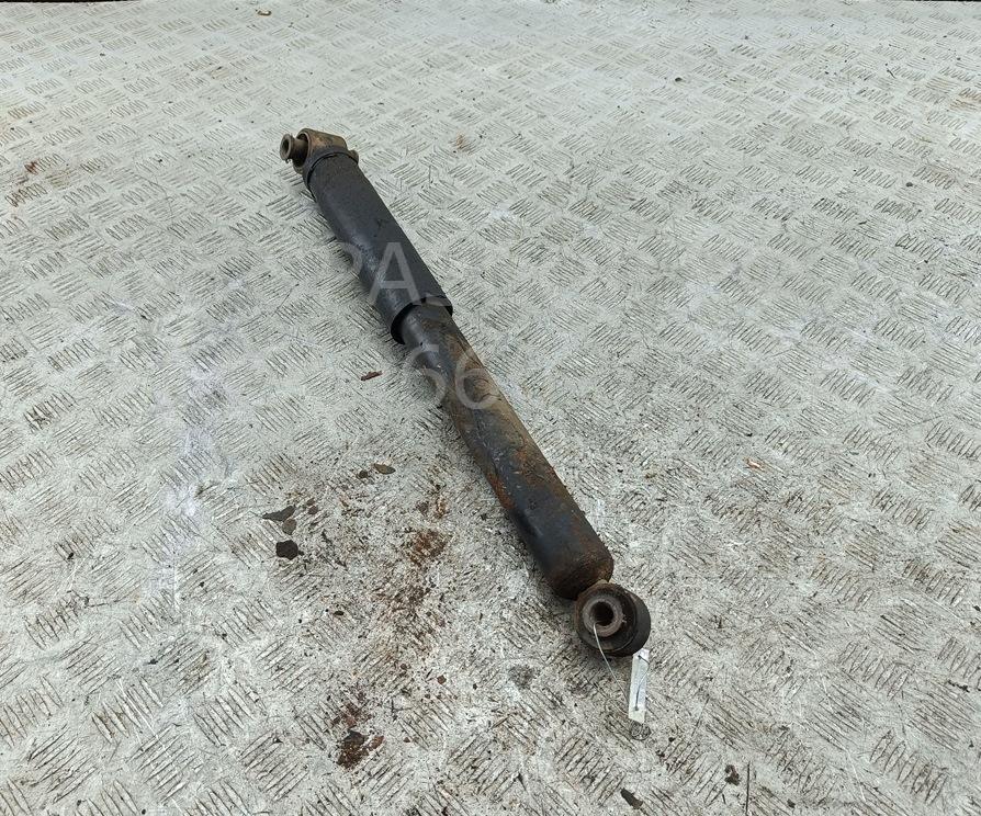 Амортизатор задний левый