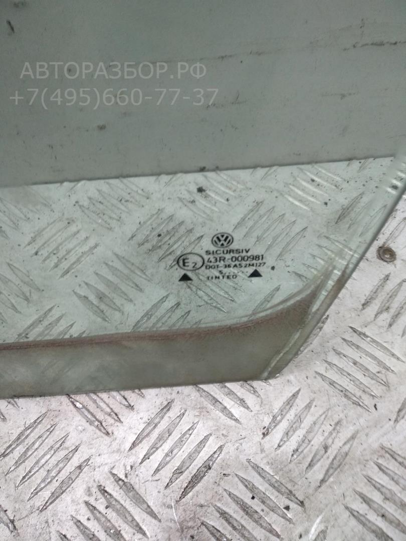 Стекло двери передней левой