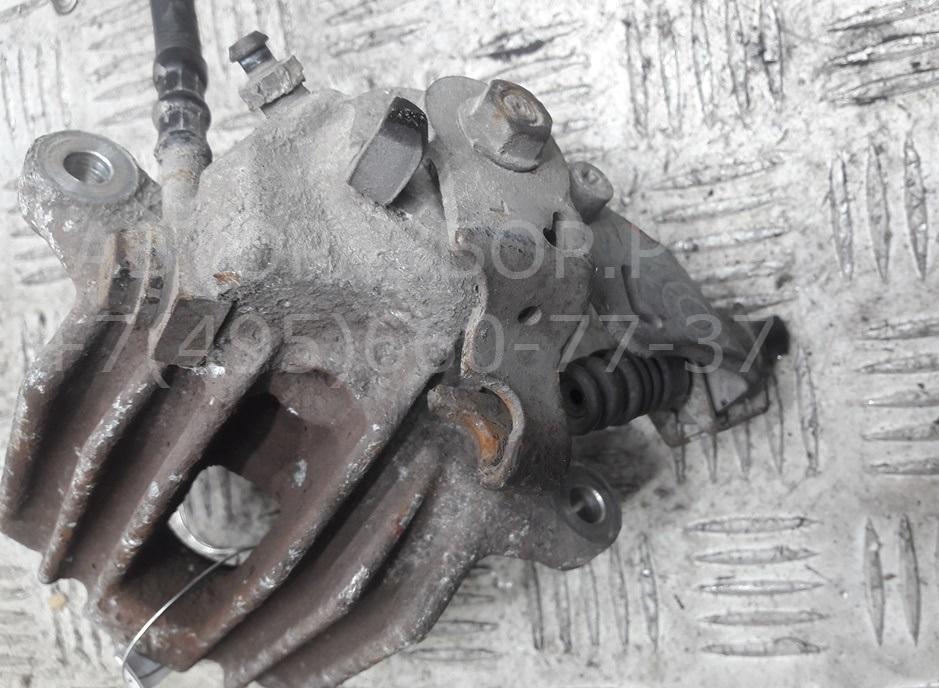 Суппорт задний левый