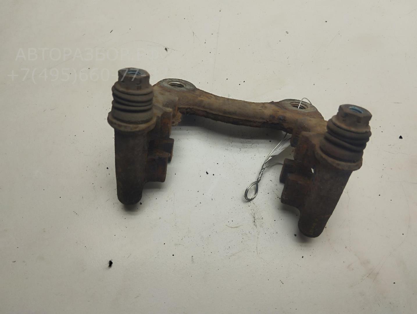 Скоба суппорта заднего