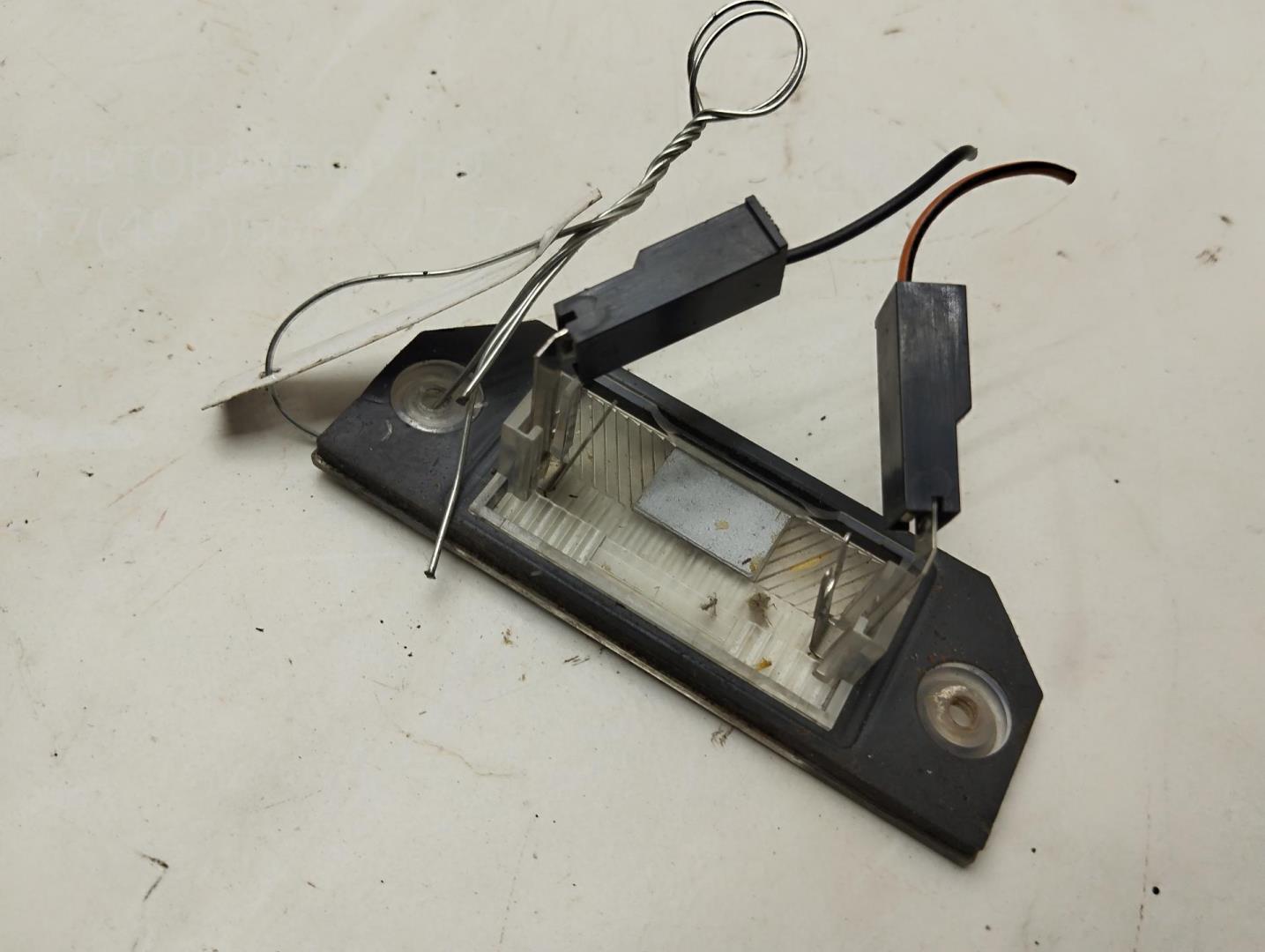 Фонарь подсветки номера