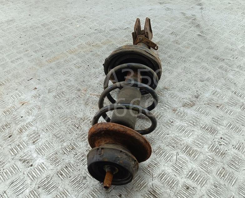 Амортизатор передний левый