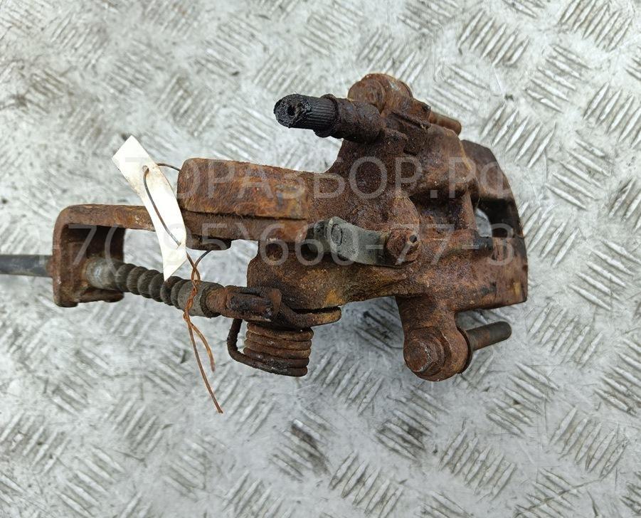 Суппорт задний левый