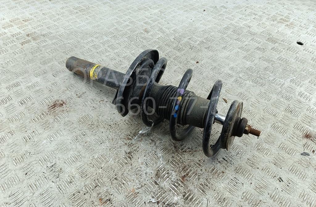 Амортизатор передний левый