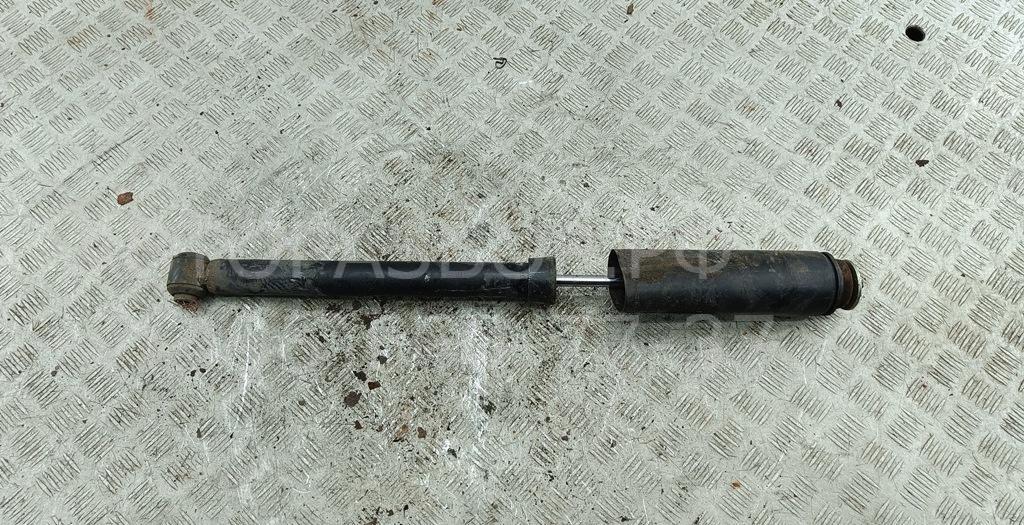 Амортизатор задний левый