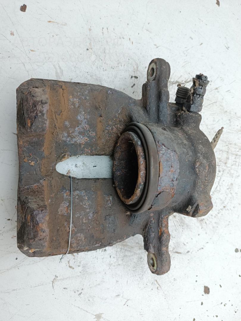 Суппорт передний левый