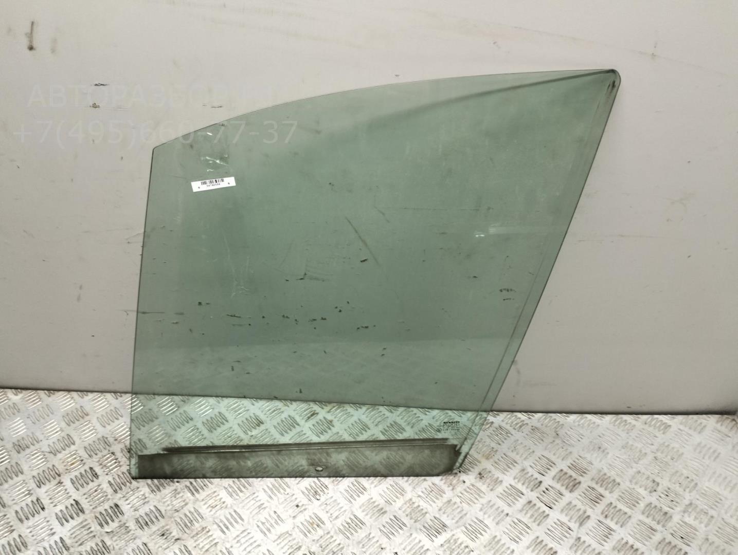 Стекло двери передней левой
