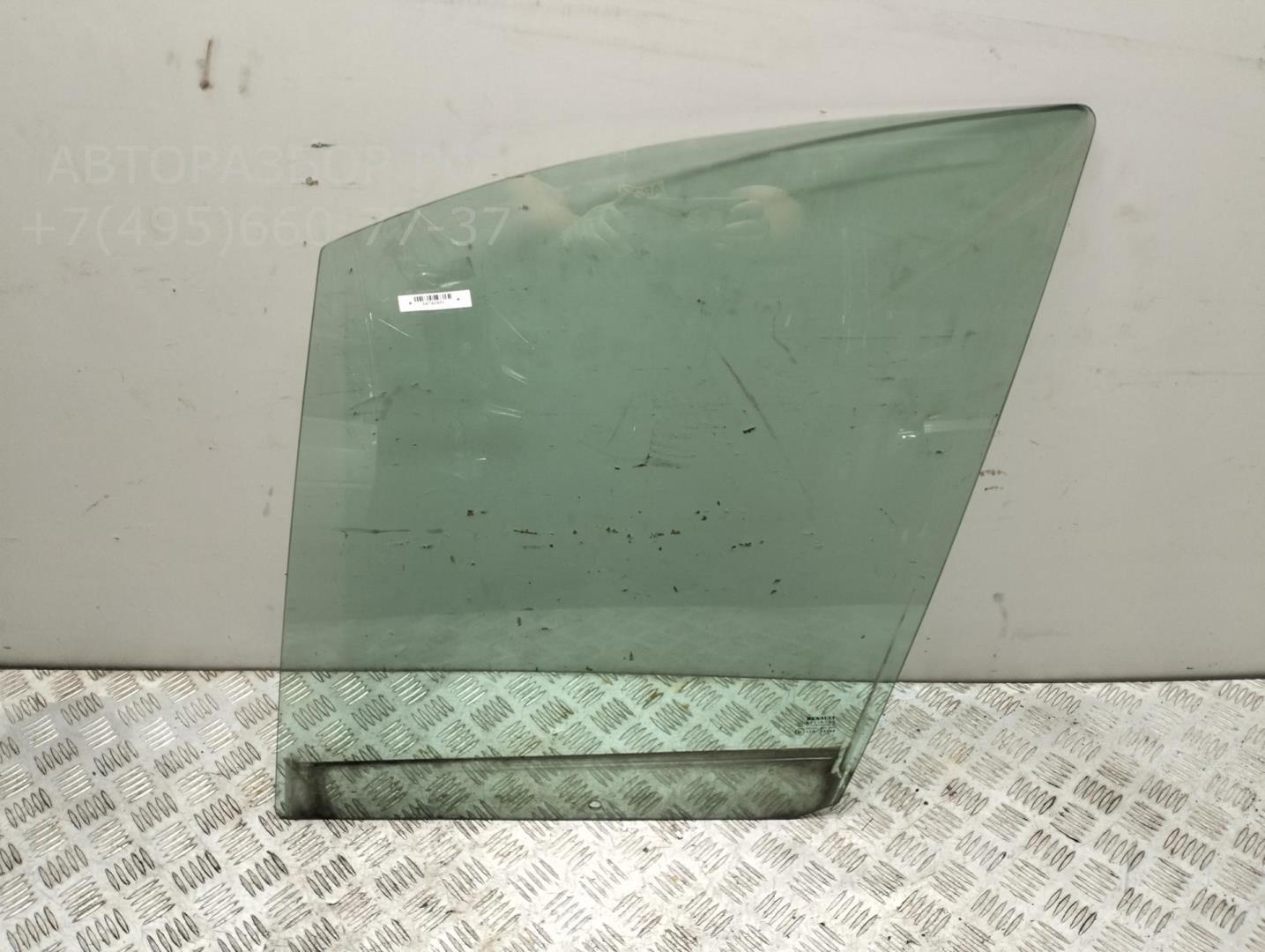 Стекло двери передней левой