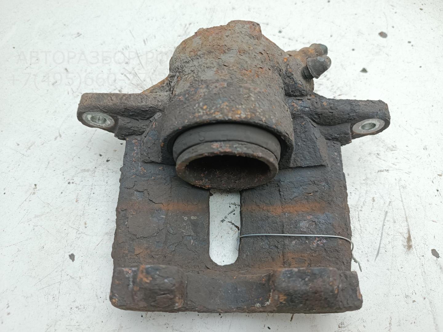 Суппорт передний левый