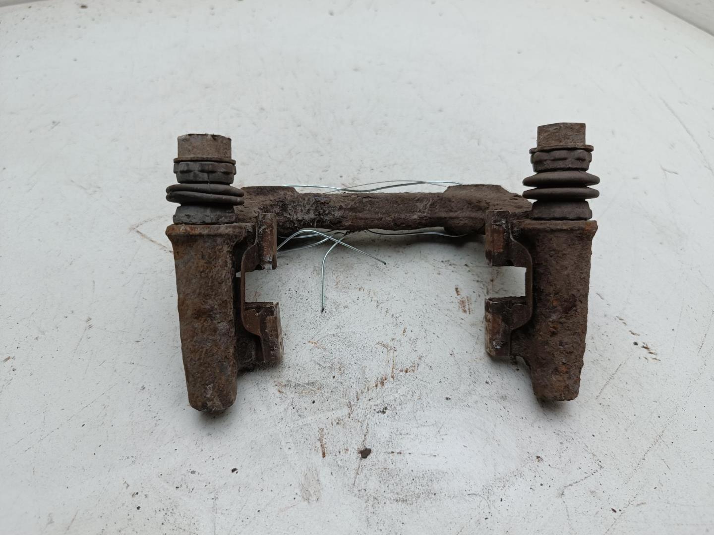 Скоба суппорта заднего