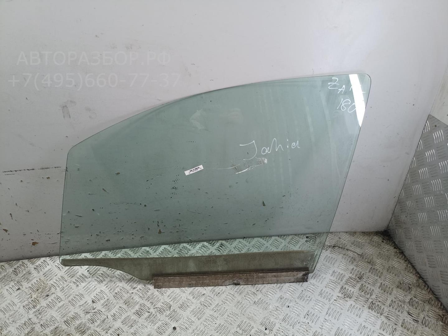 Стекло двери передней левой