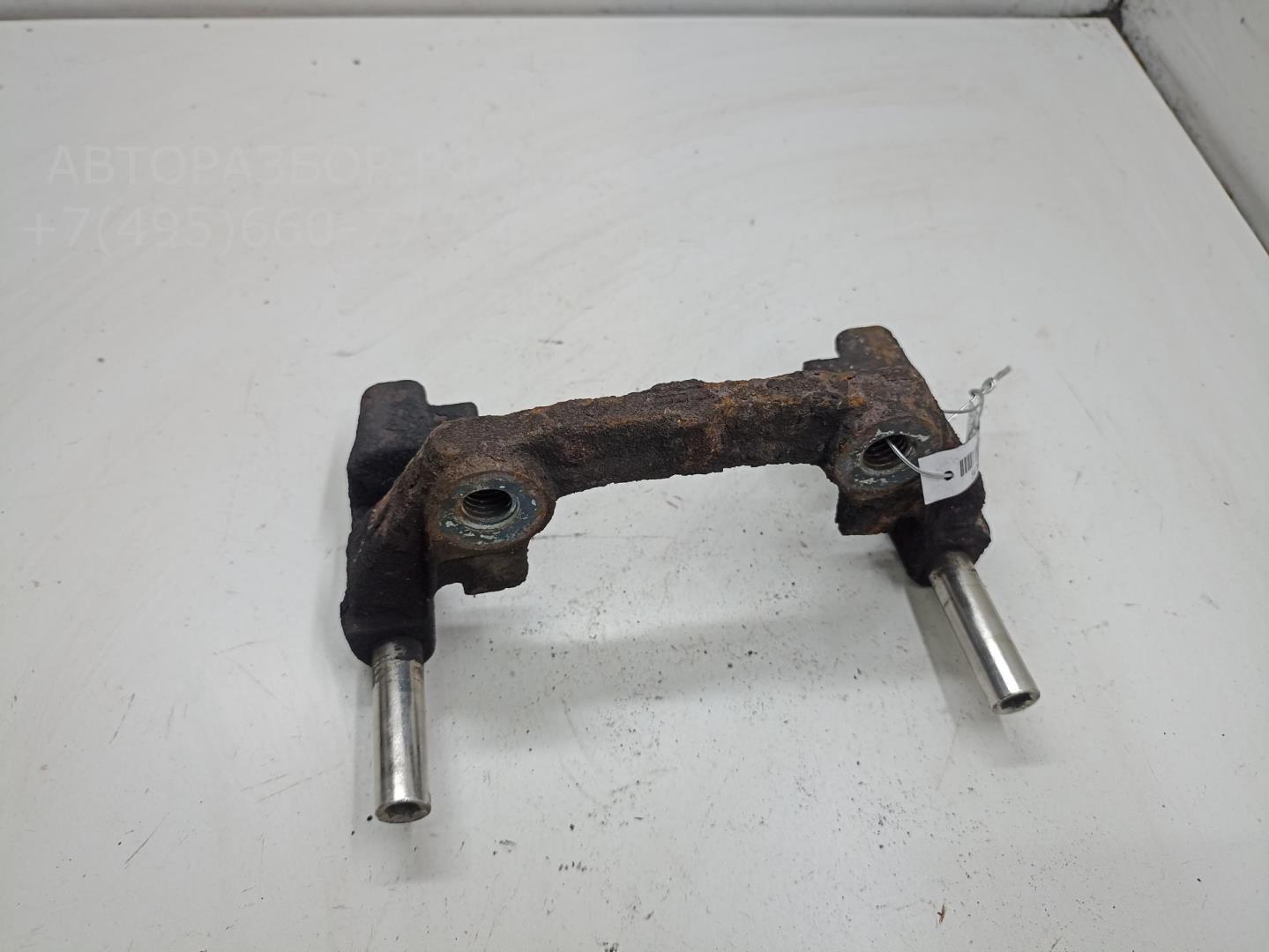 Скоба суппорта заднего