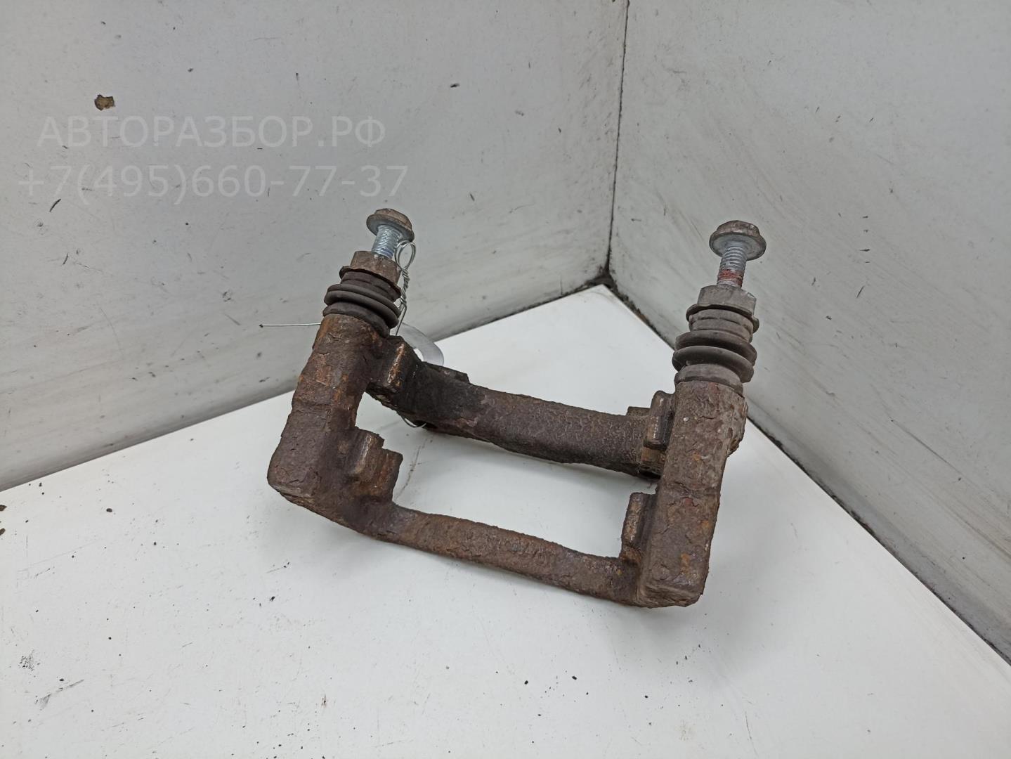 Скоба суппорта заднего