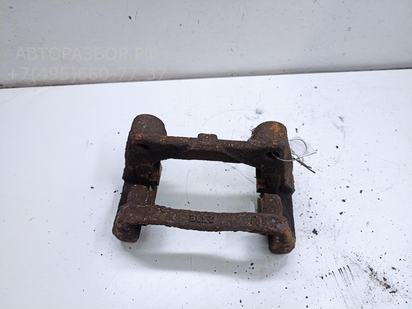 Скоба суппорта заднего